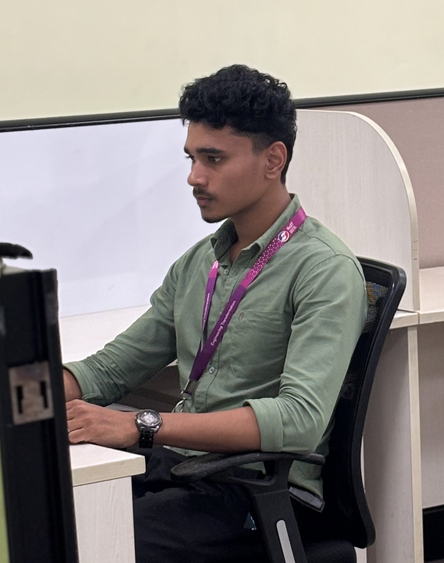 Anwarsha N S developing software applications at work